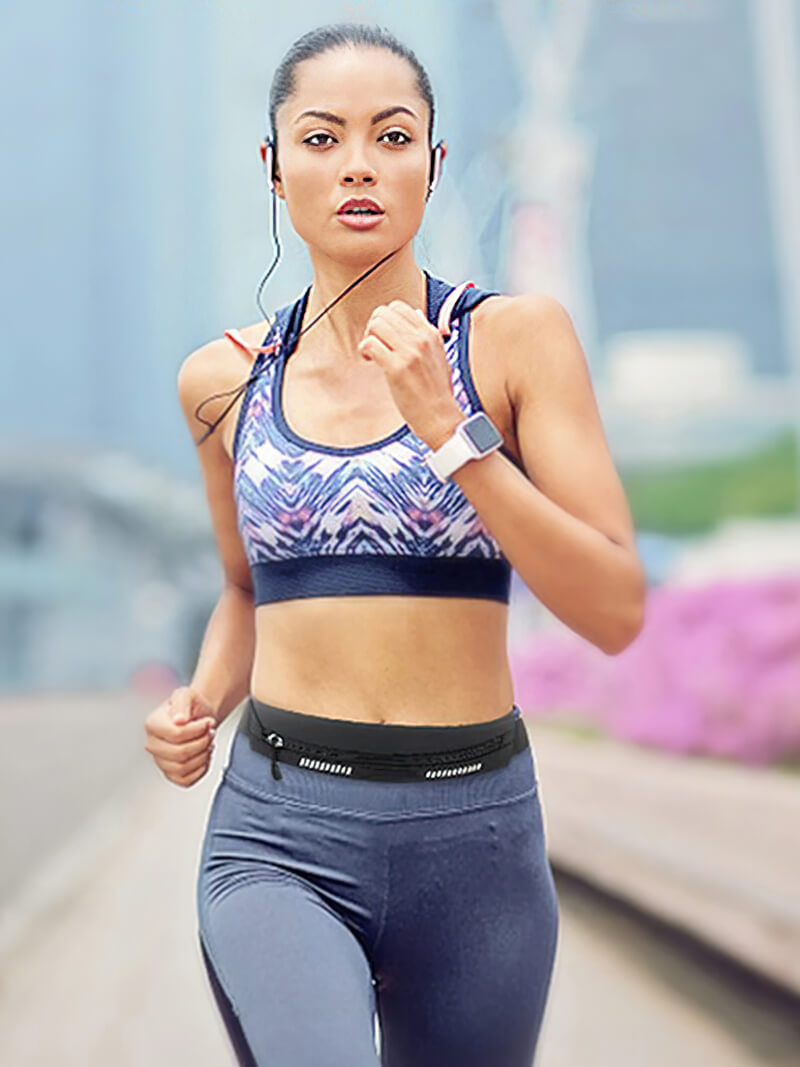 Woman jogging with waterproof waist running bag, perfect sports accessory for carrying essentials. Unisex, stylish, and available in multiple colors.