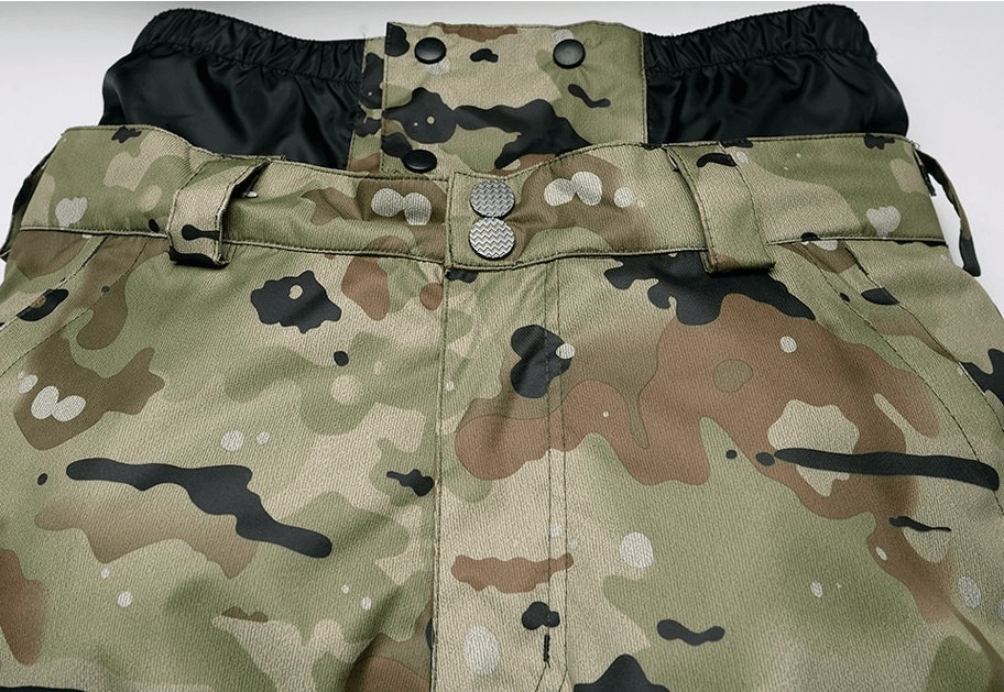 Waterproof windproof insulated men's pants with camouflage design, zipper fly, and cotton material ideal for winter sports.