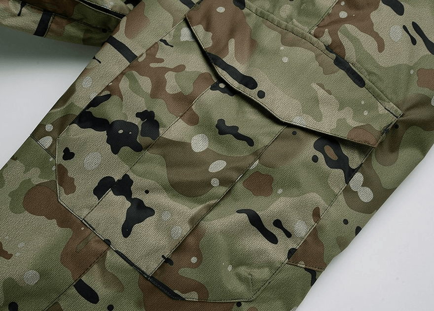 Close-up of camo-pattern waterproof windproof insulated men's sports pants - SF0733, ideal for winter activities.