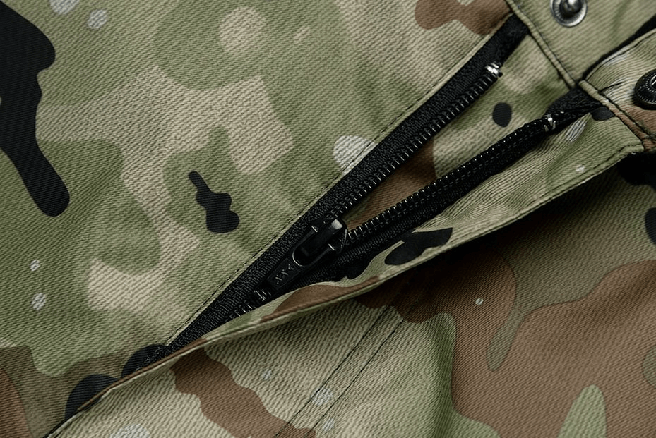 Close-up of camo waterproof windproof men's sports pants with zipper detail