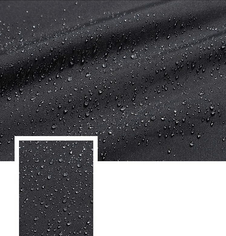 Close-up of water droplets on waterproof jacket fabric, showcasing its water-repellent features and high-performance design.