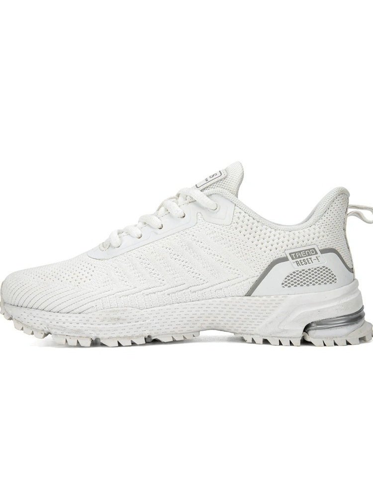 White wear-resistant non-slip women's walking shoes with mesh design, lace-up closure, and TPR outsole for durability and breathability.