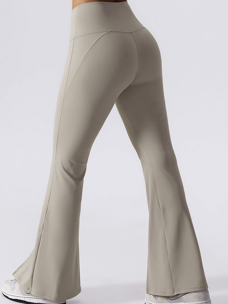 Wide leg yoga high waist pants in grey, perfect for women’s fitness and yoga sessions. Breathable nylon-spandex for flexibility and comfort.