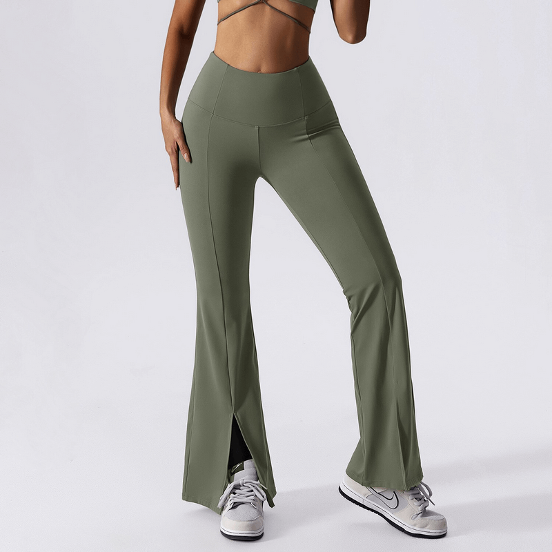 Woman in olive wide-leg yoga pants, high waist design for flexible and comfortable fitness workouts.