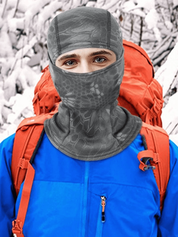 Unisex windproof camouflage scarf-balaclava in the snow, perfect for outdoor winter activities with full face coverage.