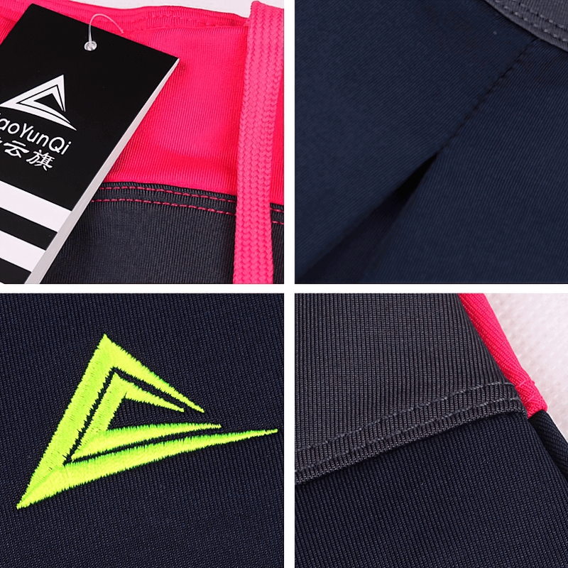 Close-up of navy Women's Breathable Tennis Skirt-Shorts with pocket detail and colorful accents, ideal for sports.