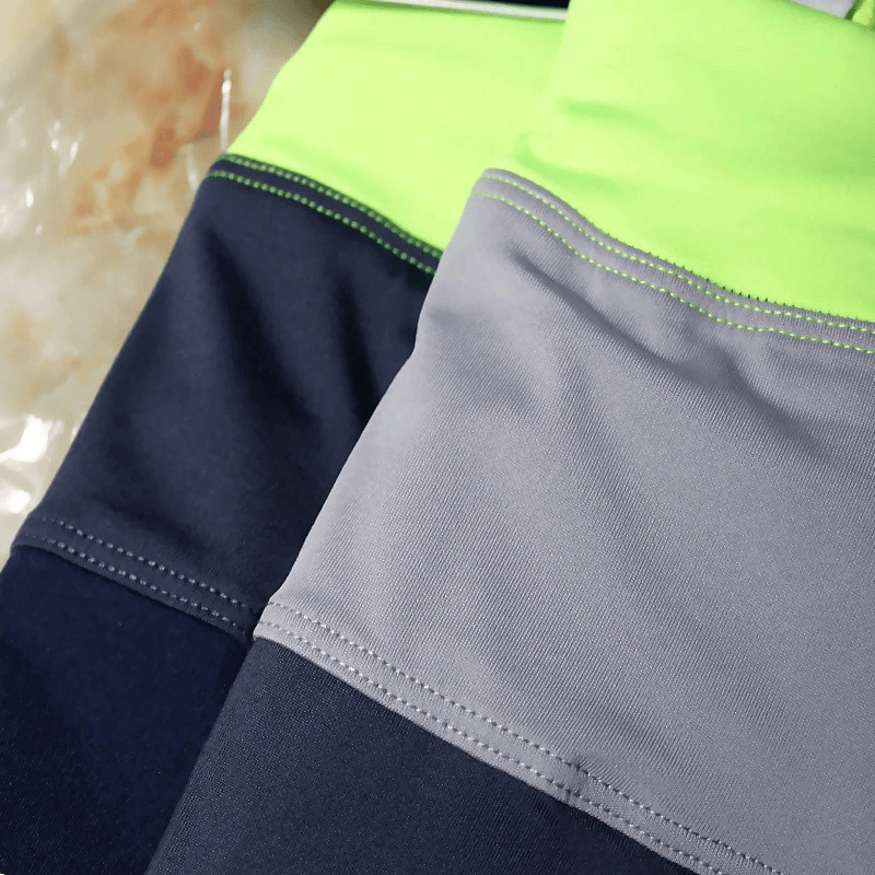Close-up of Women's Breathable Tennis Skirt-Shorts in colorful fabrics, showcasing stitching details and vibrant colors.