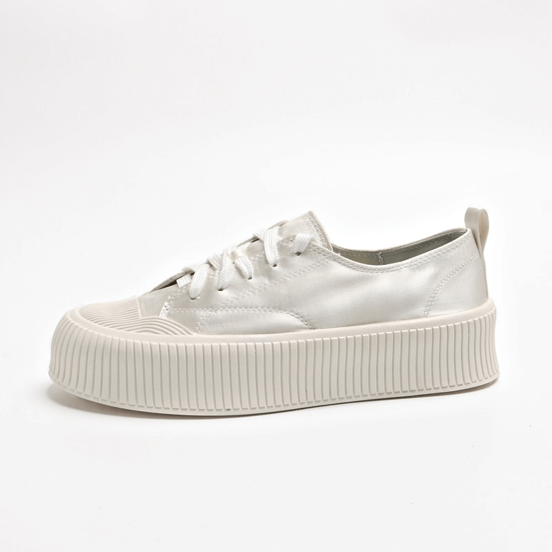 Women's white casual lace-up sports shoe with thick flat sole, perfect for comfort and durability - Model SF1008.