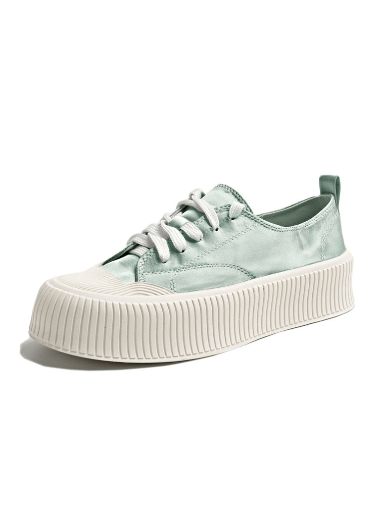 Women's Casual Lace Up Thick Flat Sole Sports Shoes in mint green with silk upper and rubber sole for comfort and durability.