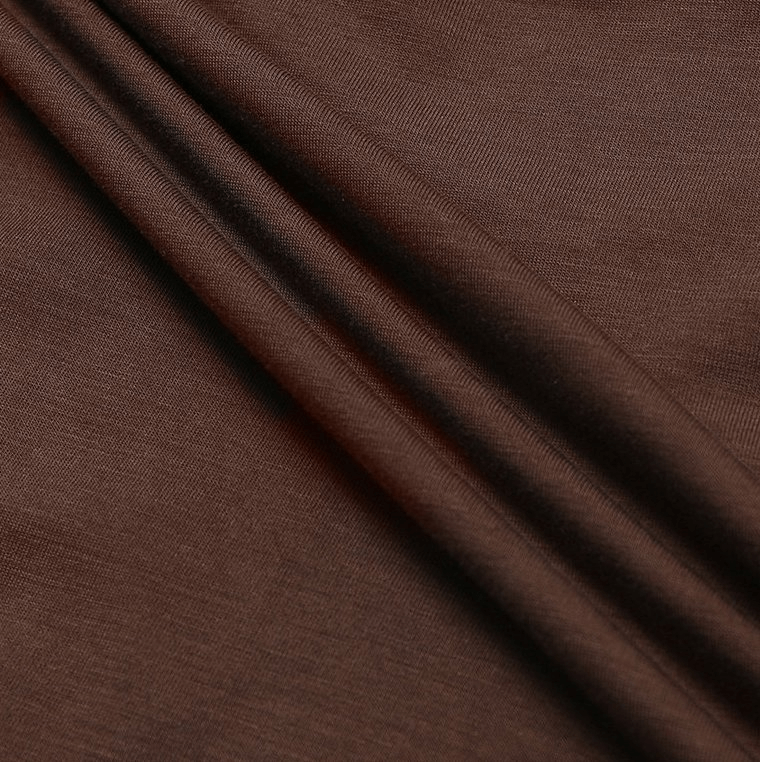 Close-up of brown fabric with soft folds showcasing texture and quality for Women's Cropped Loose Sports T-Shirt SF1147.