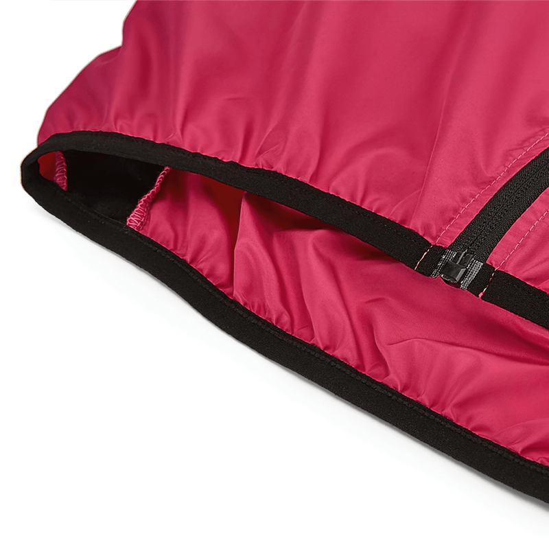 Close-up of red women's cycling windproof vest with breathable fabric and reflective logo, showcasing durable zipper and anti-pilling design.