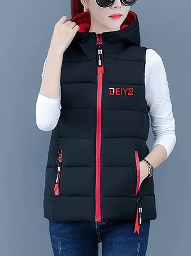 Stylish black women's down vest with red zipper pockets, hooded collar for warmth, perfect for cold weather fashion.