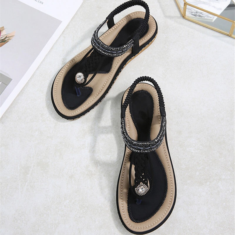 Women's flat gladiator sandals with floral pattern, crystal adornments, and comfortable PU lining. Perfect for a stylish look - SF1064.