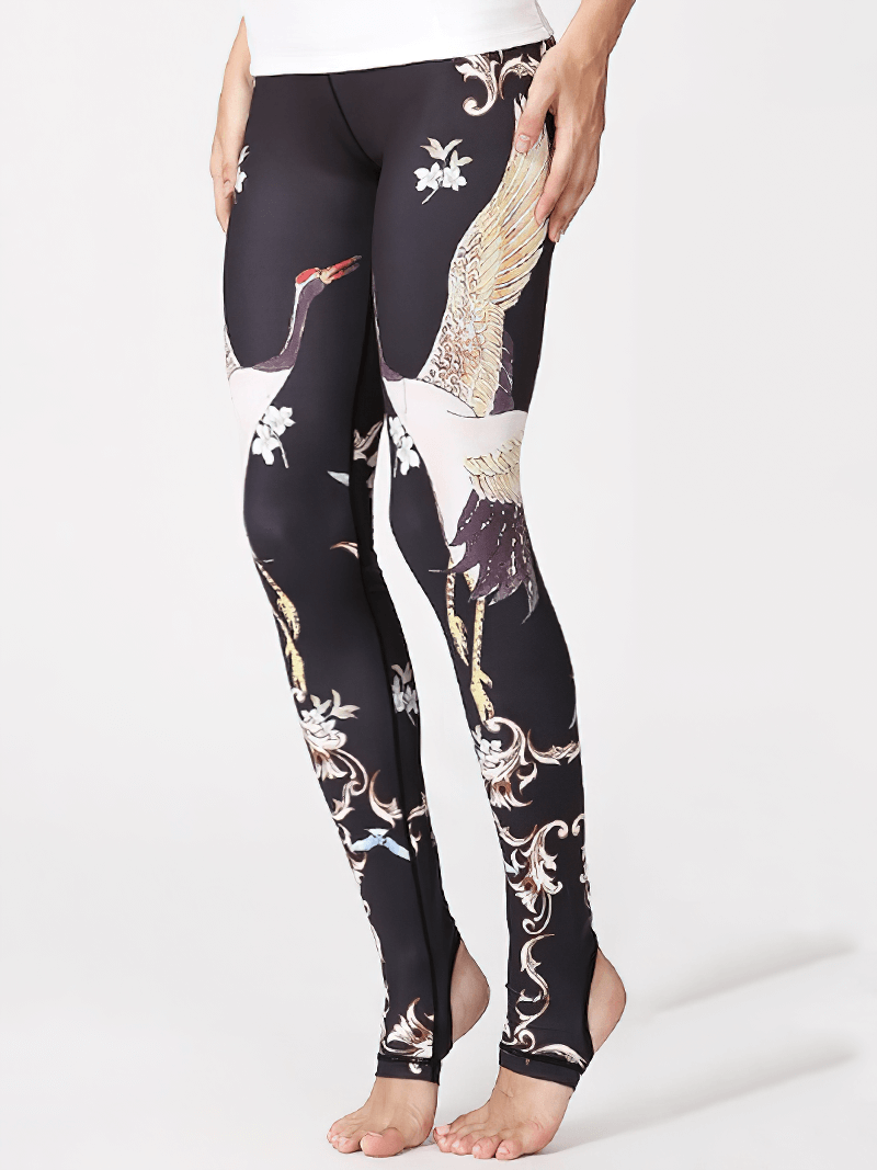 Women's floral printed leggings with open heels for yoga, featuring elegant cranes and flowers, providing comfort and style during workouts.