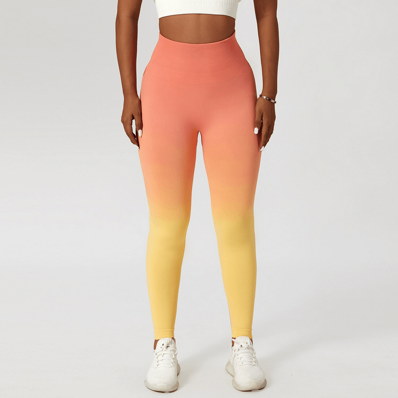 Women's gradient seamless high waist leggings for yoga in orange-yellow, elastic and ankle-length, perfect for active lifestyles.
