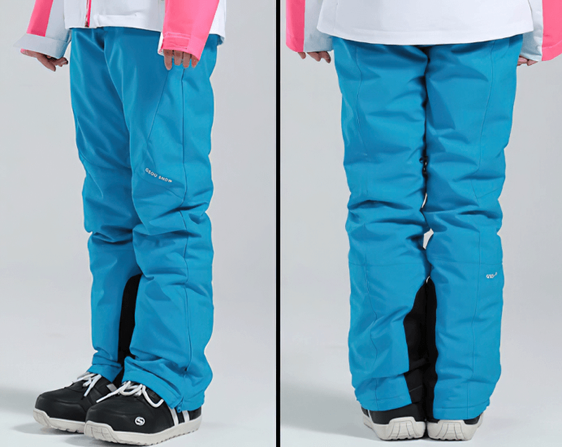 Women's high waist snow pants in blue with waterproof zipper pockets, perfect for winter sports. Style SF0694 shown front and back.