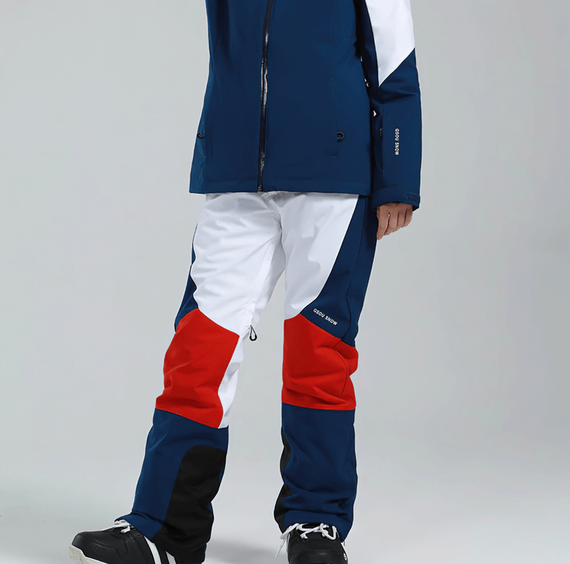 Person wearing Women's High Waist Snow Pants with colorful design and waterproof zipper pockets, perfect for skiing.