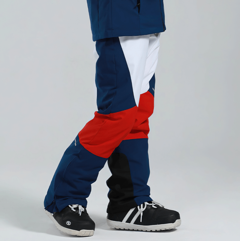 Woman wearing colorful high waist snow pants with waterproof zipper pockets, perfect for skiing and winter sports - SF0694
