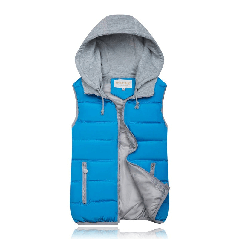 Women's blue vest with hood, featuring zipper pockets and quilting, perfect for warmth and style in colder seasons.