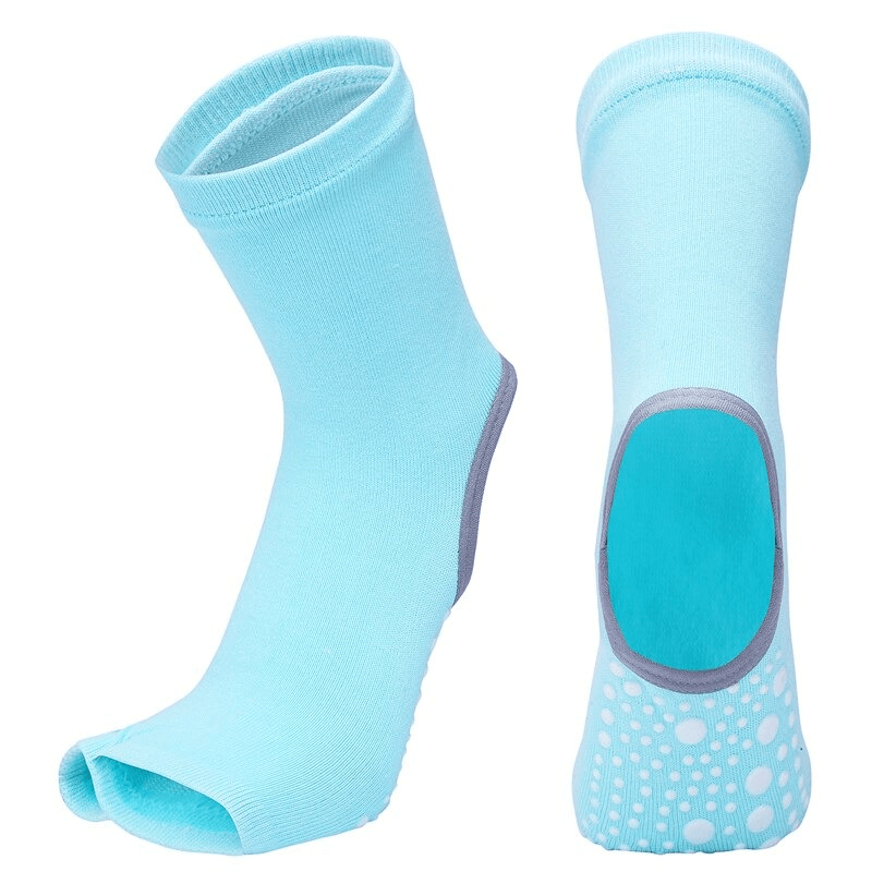 Light blue women's open toe yoga socks with non-slip silicone sole for enhanced grip and comfort during exercise.