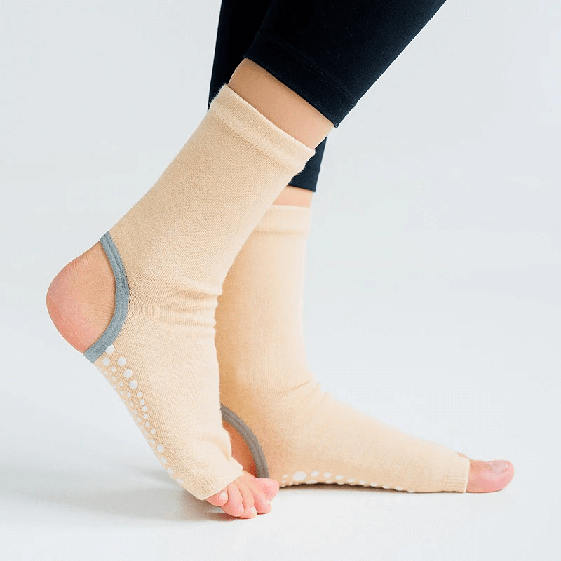 Women's open toe non-slip yoga socks with silicone sole for stability and grip, ideal for yoga, ballet, dance, and fitness.
