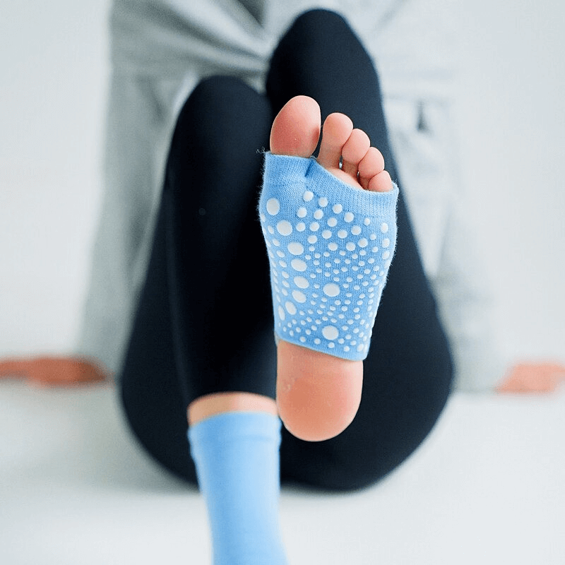 Blue Women's Open Toe Non-Slip Yoga Socks with Silicone Sole for grip and stability during yoga and fitness activities.