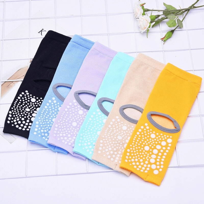 Colorful women's open toe non-slip yoga socks with silicone soles, perfect for yoga and dance. Breathable cotton for comfort and stability.