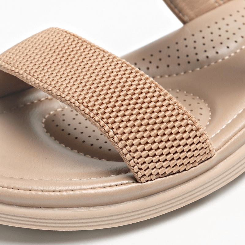 Close-up of Women's Outdoor Flat Beach Sandals with PU leather and buckle strap. Casual design, comfy platform, perfect for summer.