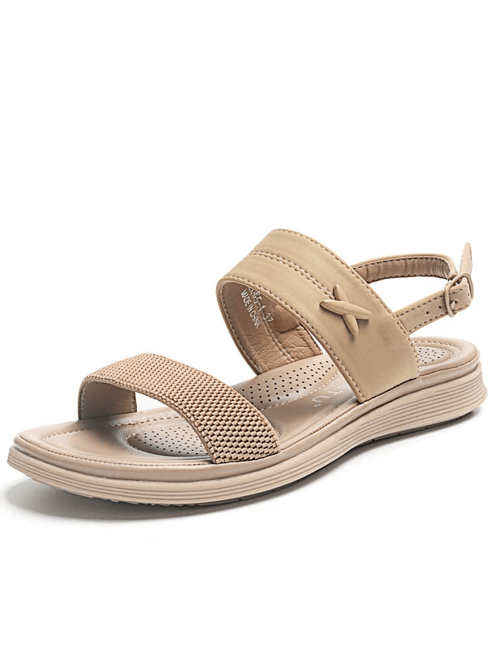 Beige women's outdoor flat beach sandal with buckle strap, perfect for casual wear, featuring PU leather and TPR outsole.
