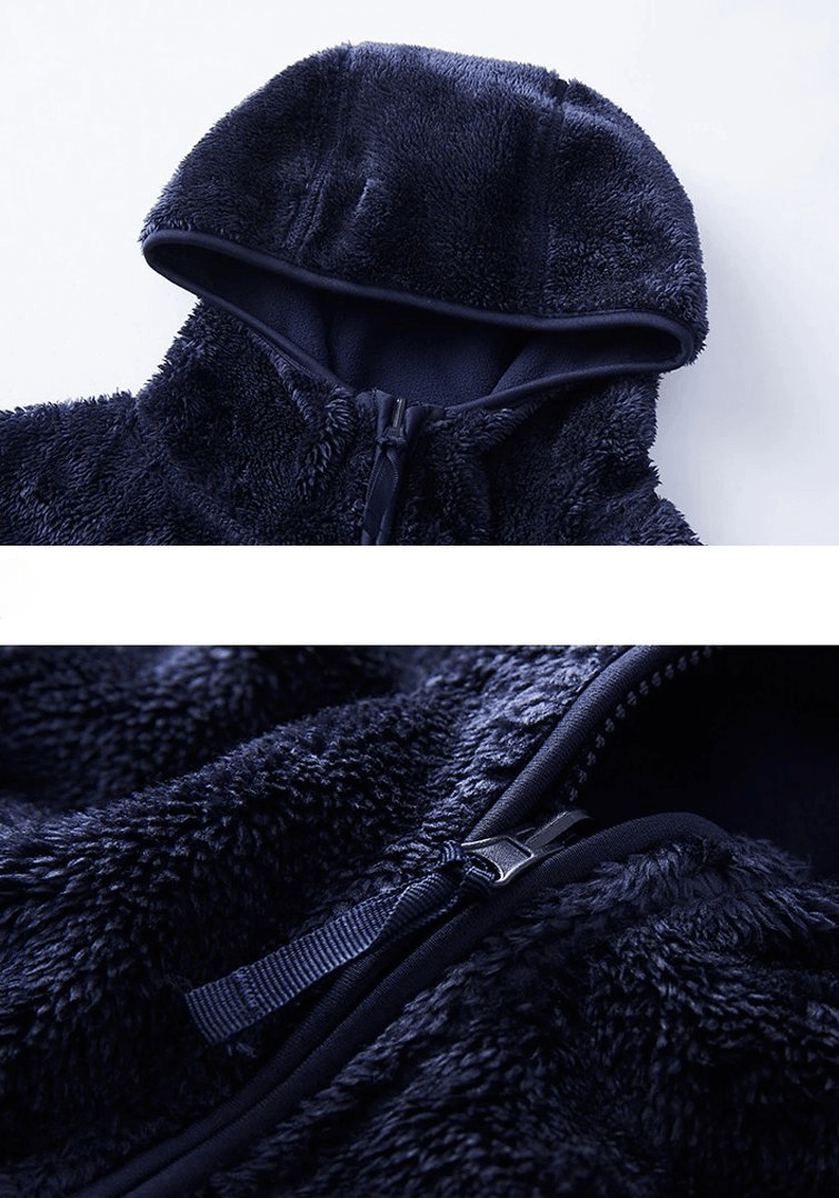 Close-up of a women's reversible fleece jacket showcasing the hood and stylish zipper detail, perfect for a trendy, versatile look.