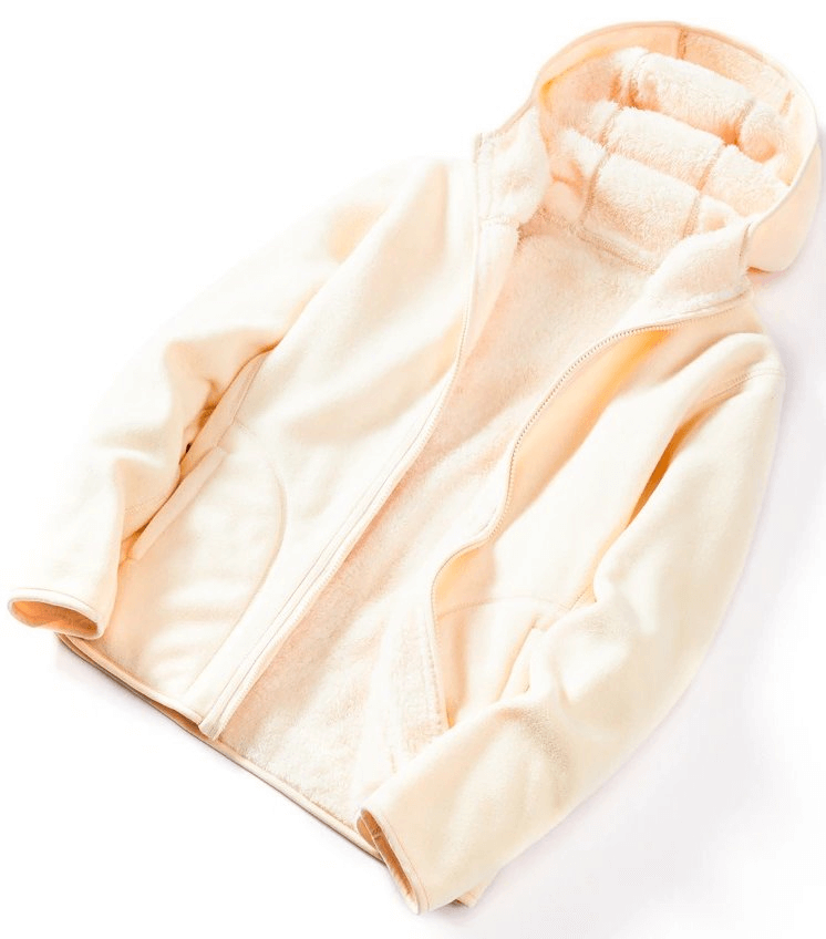 Women's reversible fleece jacket with hood, zip-up pullover style, cream color, soft and stylish fabric showcasing comfy design.