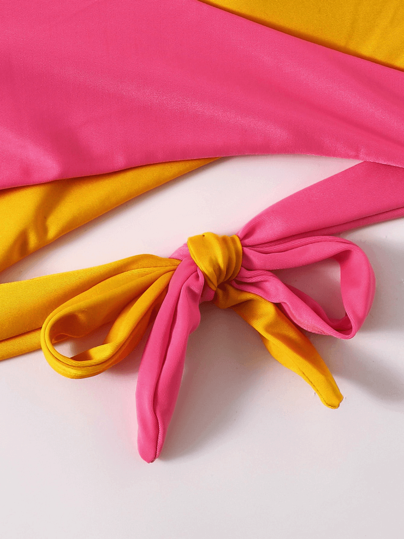 Colorful tie-back women's swimsuit in pink and yellow, SF1049, showing elegant fabric and low waist design, perfect for summer beach days.