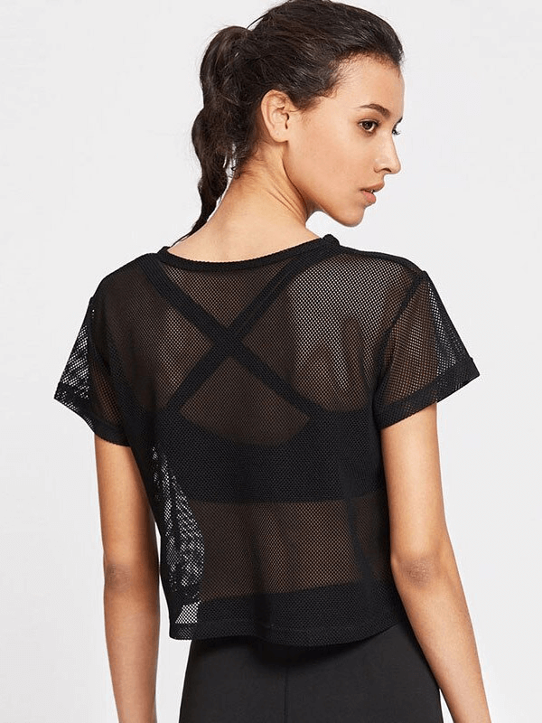 Back view of a woman wearing a black mesh short sleeve t-shirt, ideal for sexy running and fitness, highlighting breathable athletic wear.