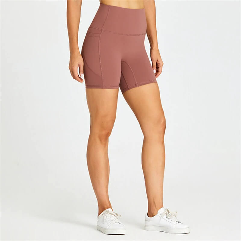 Women's short tight solid color shorts with pockets for workouts, nylon-spandex blend, flexible and breathable fabric, SF0407