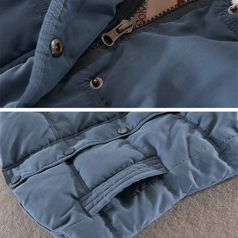 Close-up of women's sleeveless cotton jacket featuring zipper and button details in elegant blue fabric.