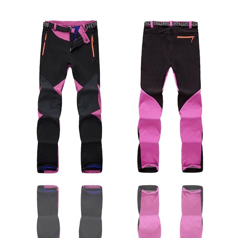 Women's pink and black softshell skiing pants with thermal fleece, ideal for outdoor trekking. Stylish and durable design, SF0716.