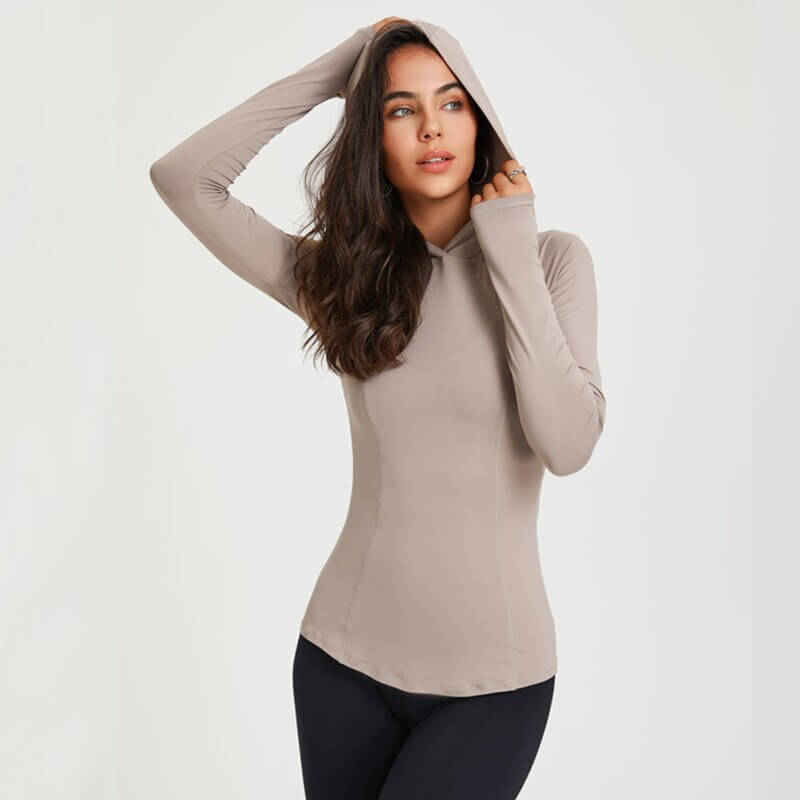 Women's quick-dry sports slim hoodie with hood, perfect for yoga and fitness, in light beige color, showcasing athletic style and flexibility.