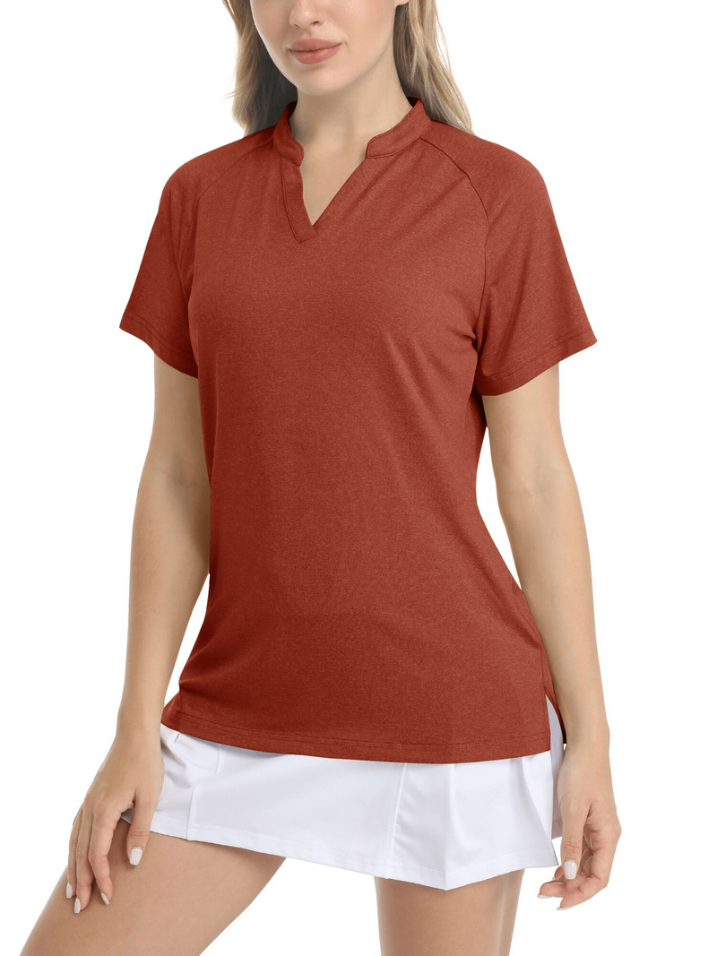 Women's red V-neck sports t-shirt with short sleeves, perfect for a casual or sporty look, shown on a model wearing a white skirt.