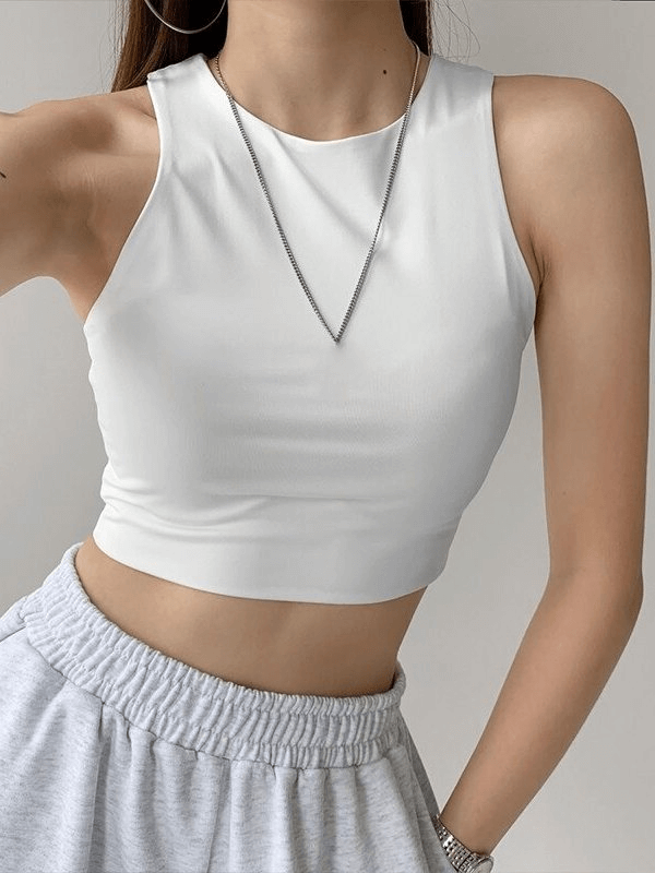 Women's cropped seamless sports top in white for comfort and mobility during workouts, made from breathable, quick-drying spandex - SF0026