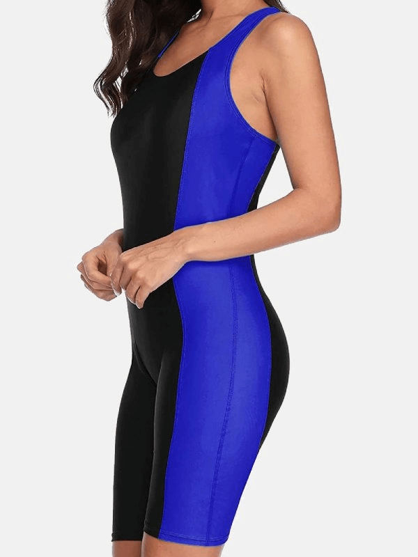 Women's sporty beach knee-length swimwear in black and blue with patchwork pattern, perfect for swimming. Made of polyester and spandex.