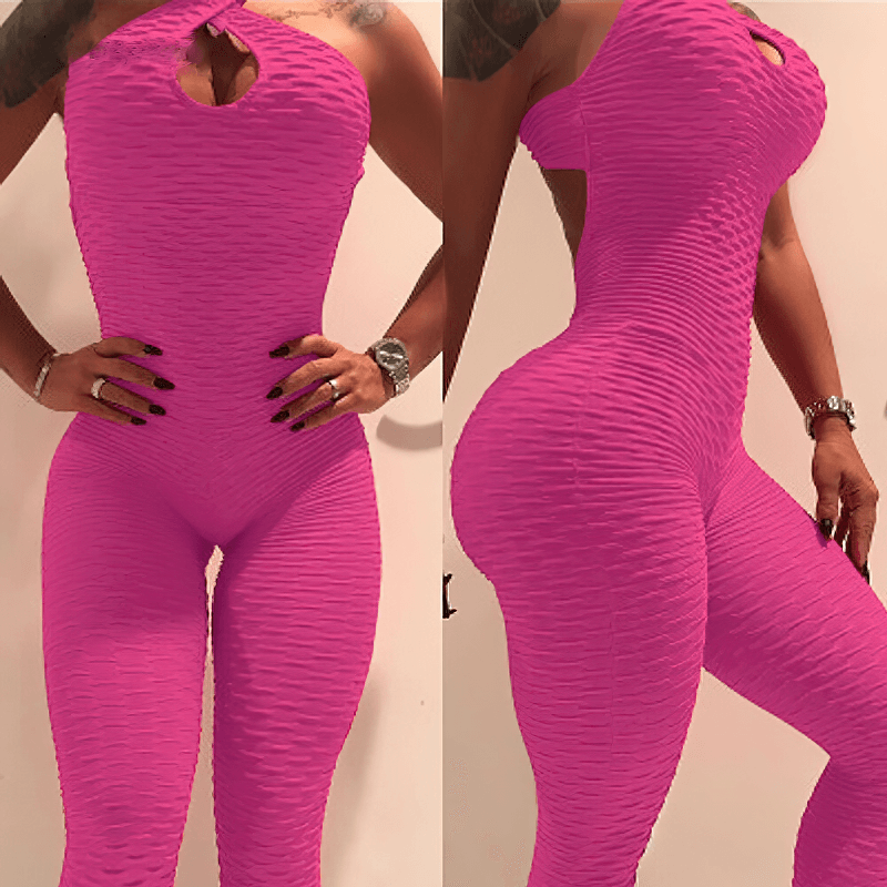 Bright pink textured open-back yoga jumpsuit for women, showcasing a form-fitting, breathable design perfect for yoga and active wear.