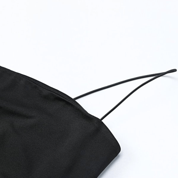 Close-up of black women's jumpsuit with thin straps, sleek design, and quality polyester fabric - fashion forward playsuit SF1047.