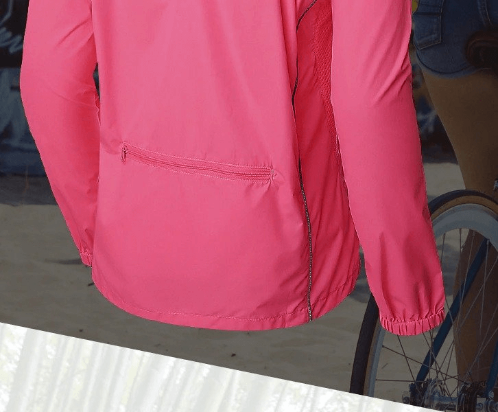 Back view of pink women's waterproof reflective bicycle jacket with long sleeves, designed for cycling and outdoor adventures.