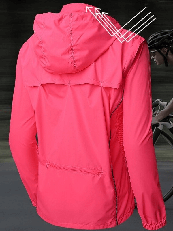 Women's waterproof reflective bicycle jacket in pink, featuring a hood, removable sleeves, and cyclist illustration in the background.