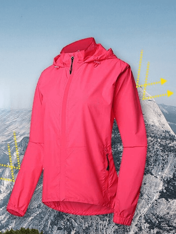 Women's pink waterproof reflective bicycle jacket with long sleeves, featuring a hood and mountain background, ideal for outdoor adventures.