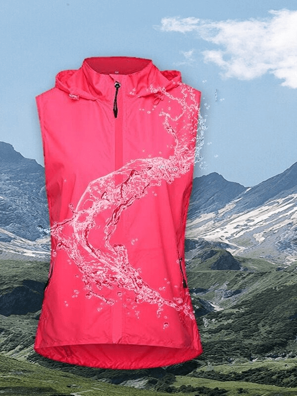 Women's pink waterproof reflective bicycle jacket in scenic mountain setting, ideal for cycling, hiking, and fishing.