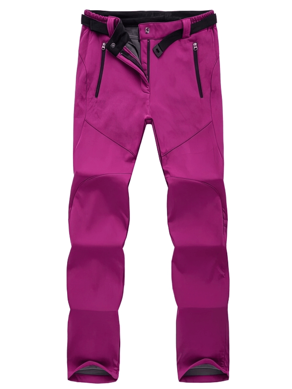 Magenta women's waterproof sports pants, fleece lined, full-length with zipper closure, ideal for hiking and outdoor activities.