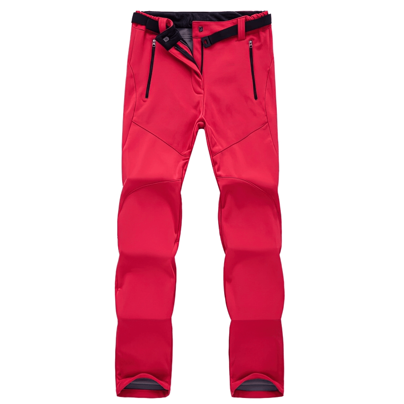 Women's waterproof fleece hiking pants in red, designed for comfort and protection. Features zipper fly and breathability for outdoor sports.