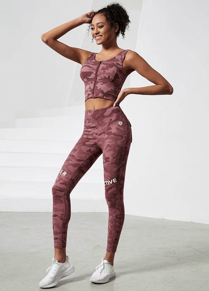 Woman wearing Workout Camouflage High Waist Seamless Leggings with Pockets for yoga and running, showcasing 4-way stretch and breathability.