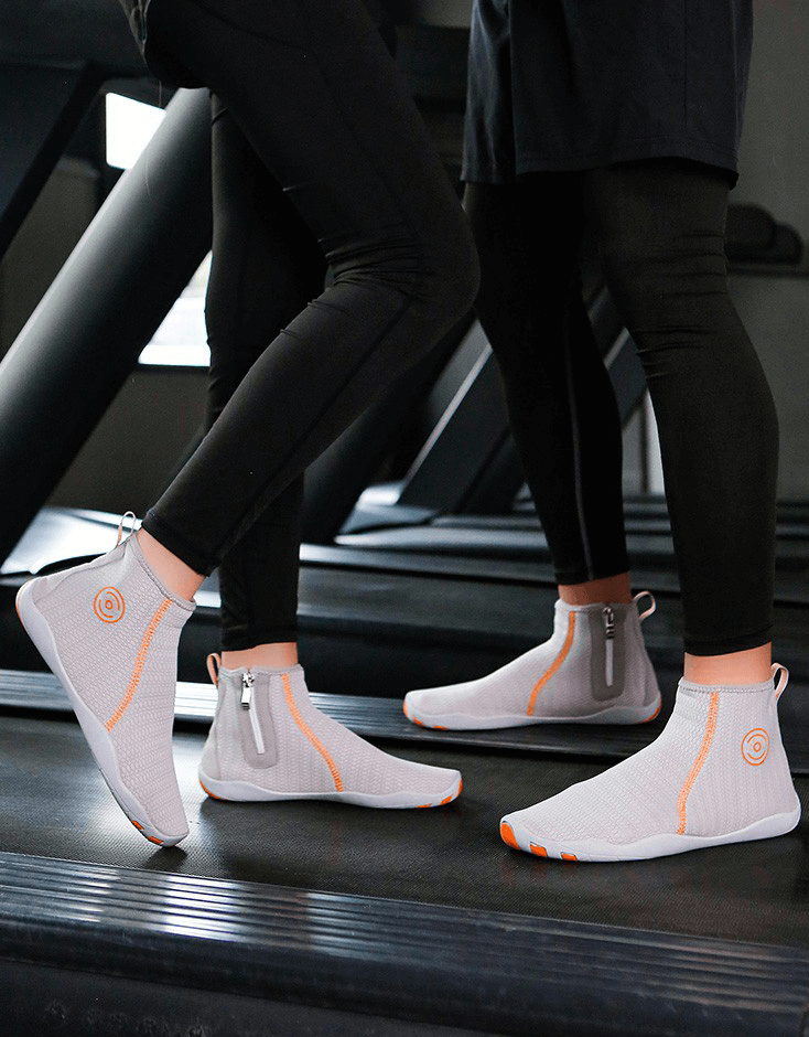 Two people wearing Zipper Breathable Water Shoes SF1191 with mesh uppers and rubber outsoles, perfect for outdoor sports and swimming.